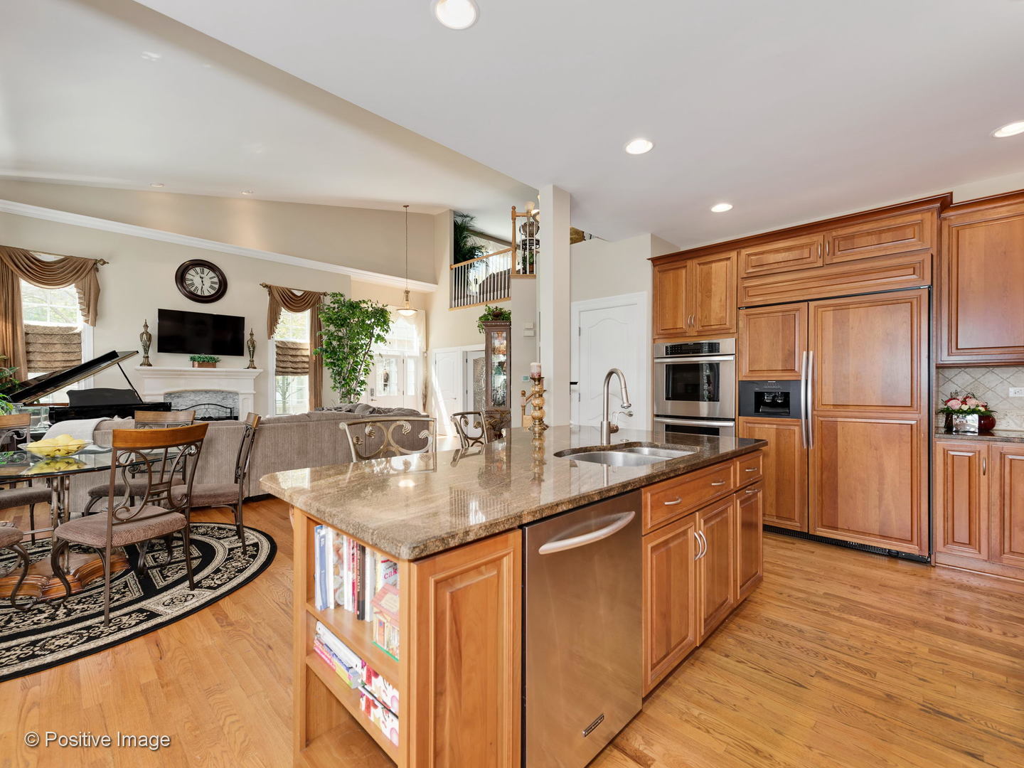 1763 Park Ridge, Unit 1763 Park Ridge, IL 60068 - Photo 14 of 34 a kitchen with stainless steel appliances granite countertop a stove top oven a sink and a refrigerator