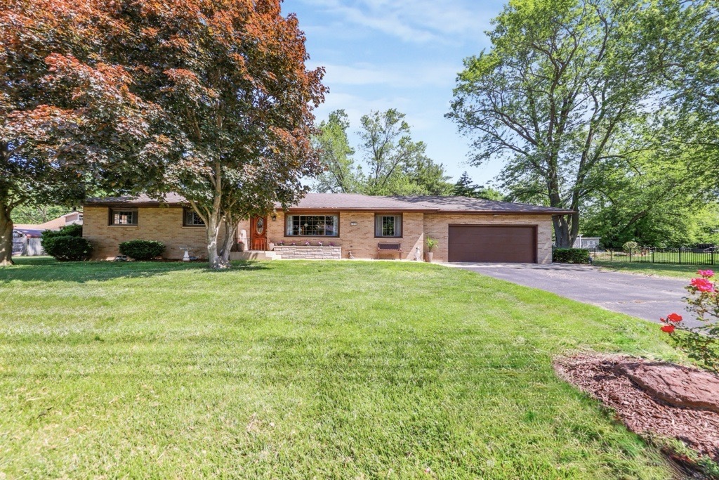 480 West Kennedy Road Braidwood, IL 60408 - Photo 1 of 25 a front view of house with yard and green space