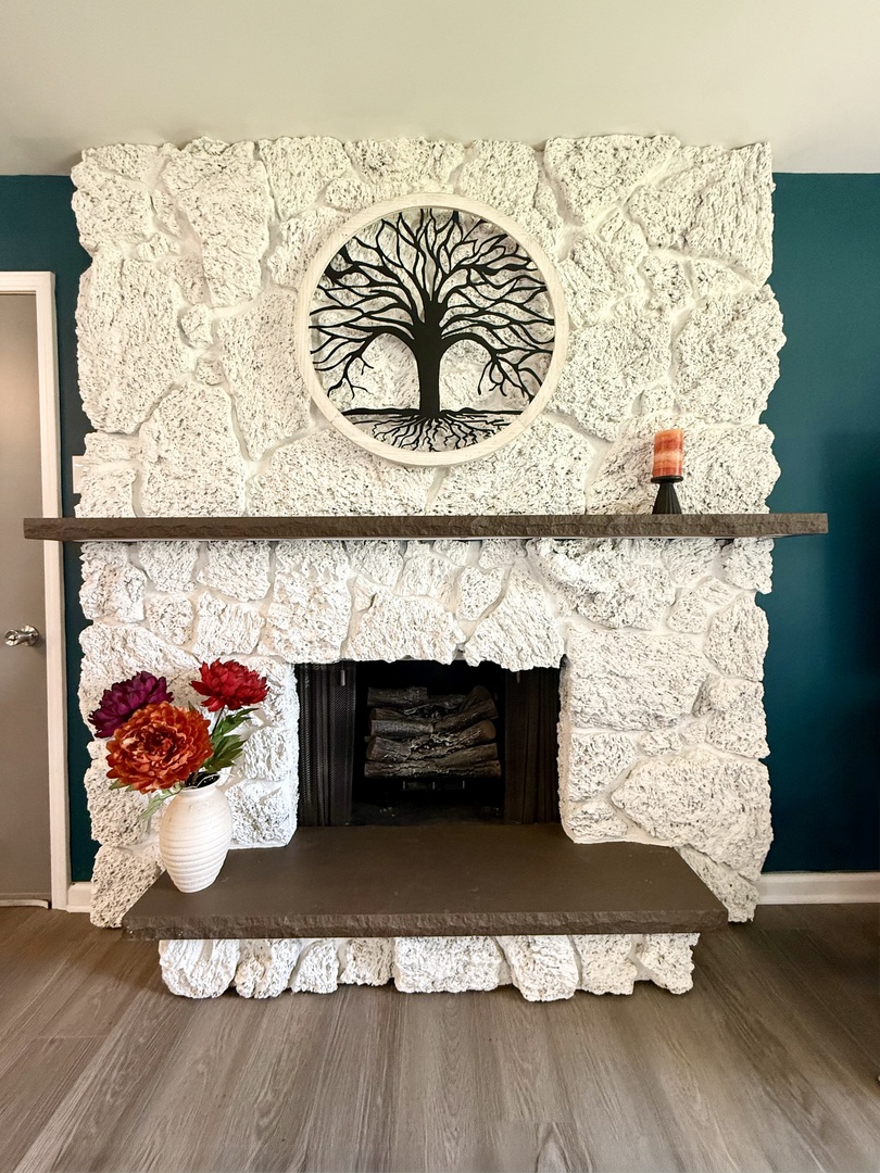 480 West Kennedy Road Braidwood, IL 60408 - Photo 6 of 25 a room with a fireplace and wooden floor