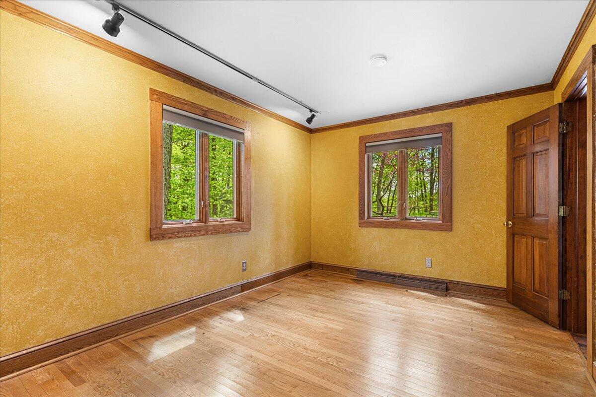 9561 Maple Tree Road Farmington, WI 53040 - Photo 14 of 55 Main Floor Bedroom