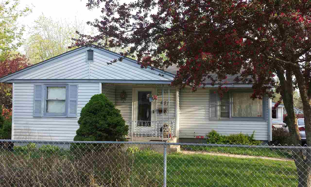 831 Brooke Road Rockford, IL 61109 - Photo 1 of 1 a front view of a house with garden