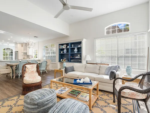 a living room with furniture and a table