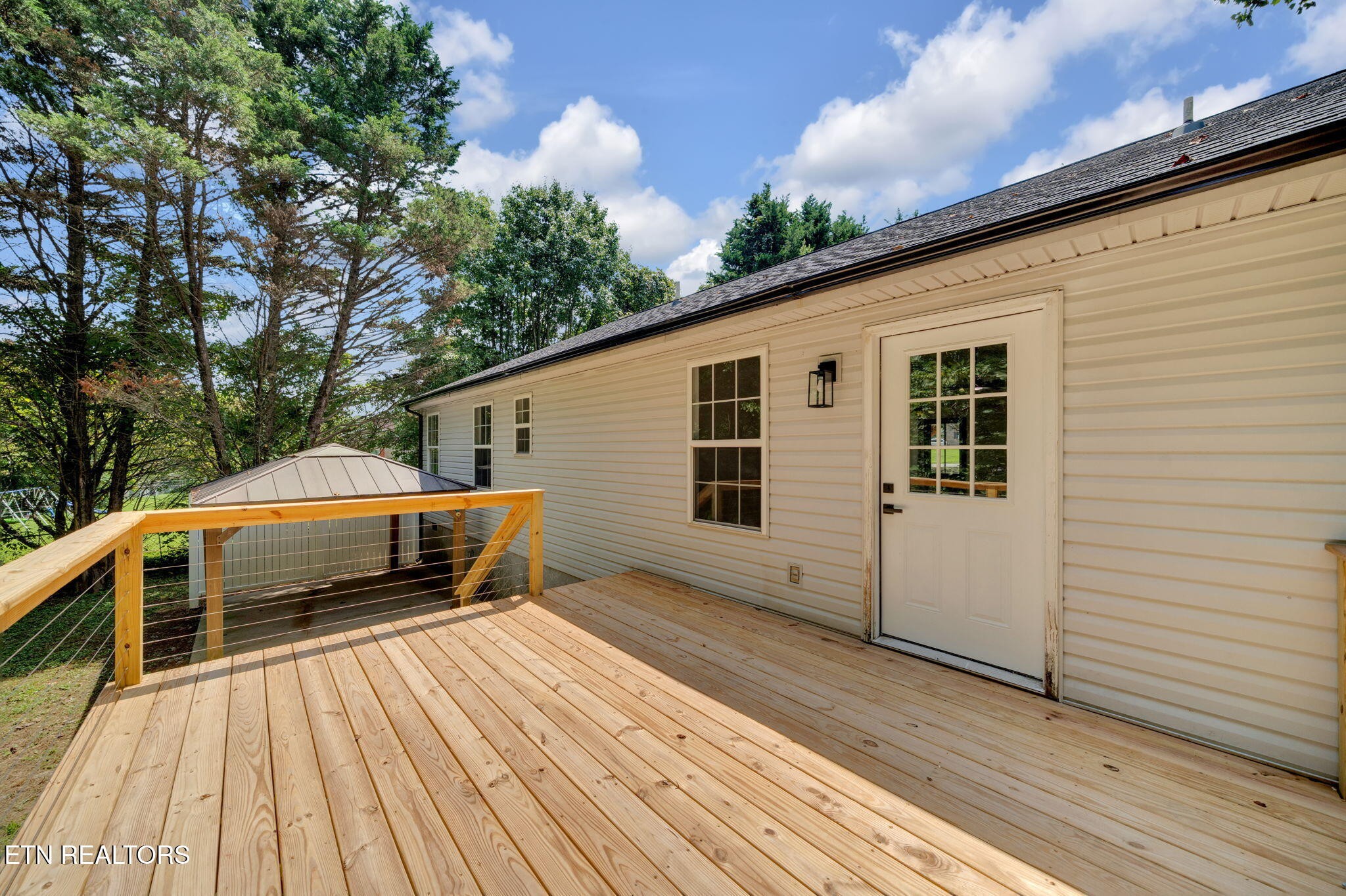 1217 Hoss Road Powell, TN 37849 - Photo 28 of 40 a front view of a house with a yard
