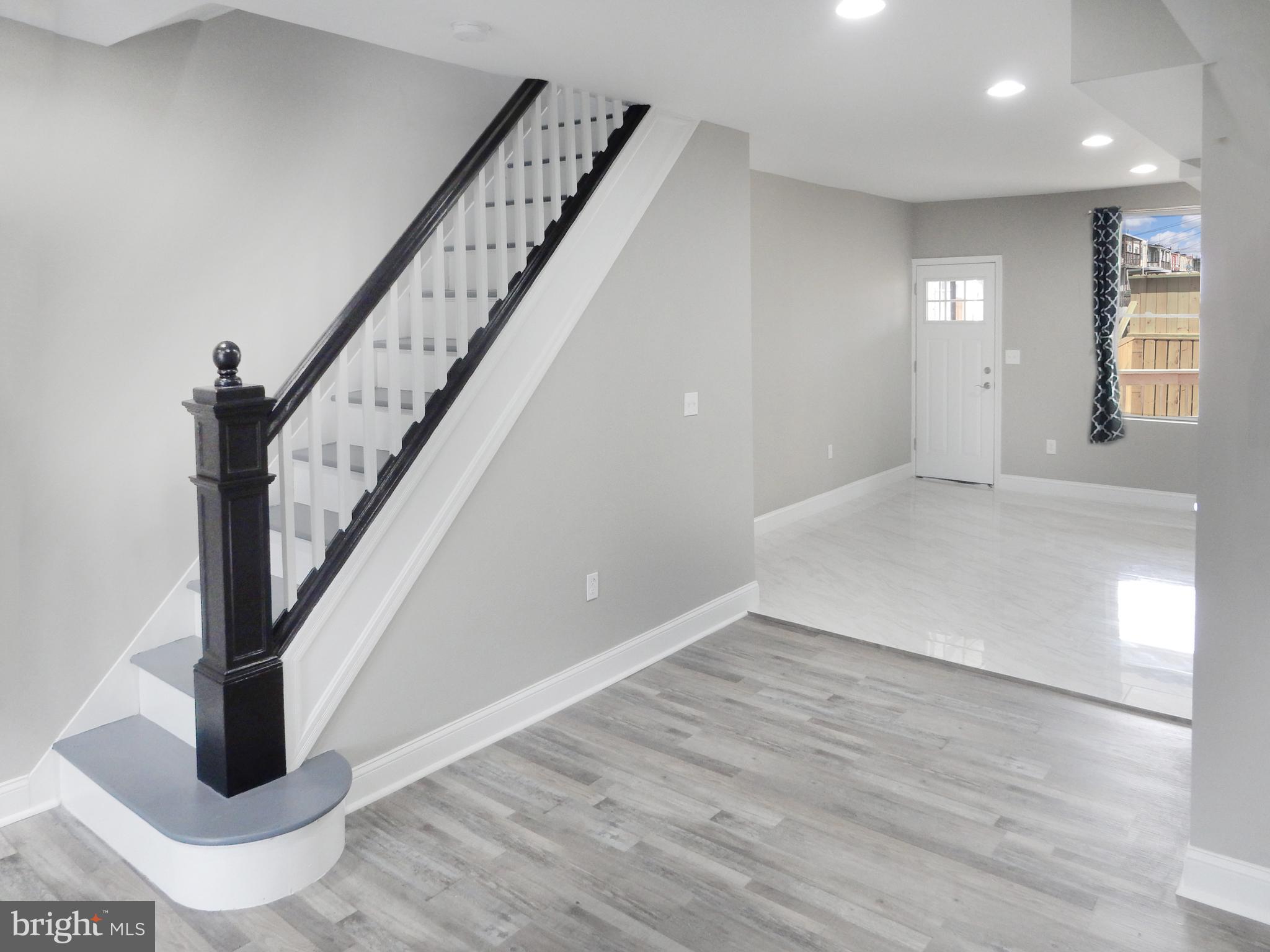 1111 Bayard Street Baltimore, MD 21223 - Photo 11 of 41 a view of an entryway with wooden floor