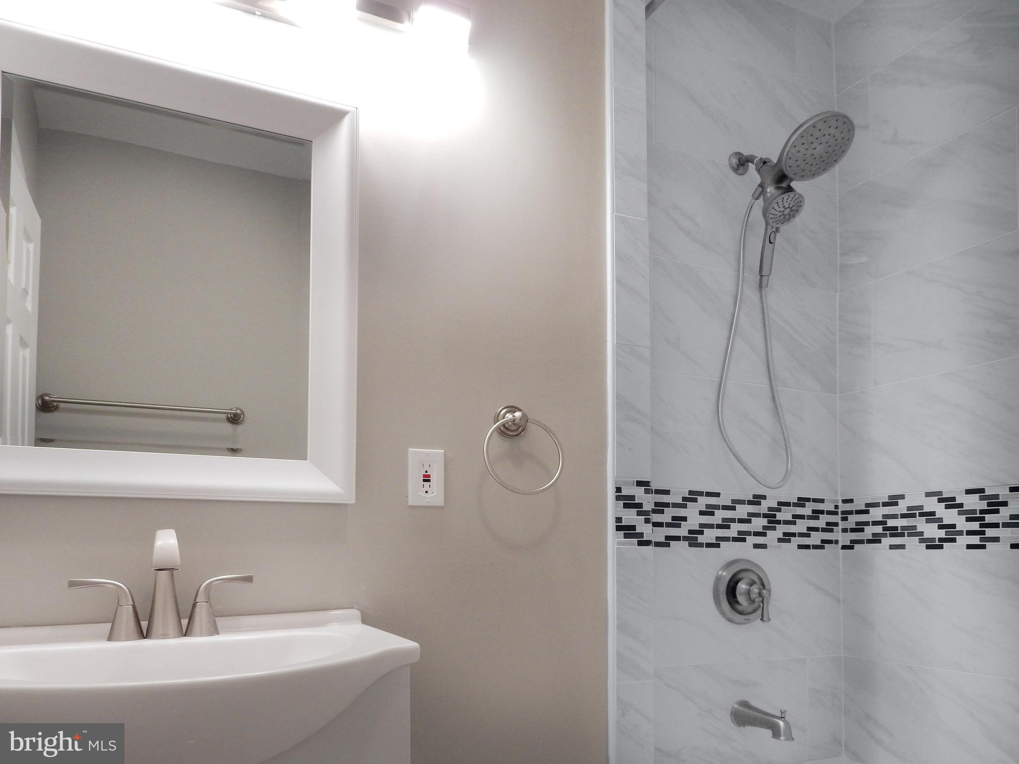 1111 Bayard Street Baltimore, MD 21223 - Photo 20 of 41 a bathroom with a shower