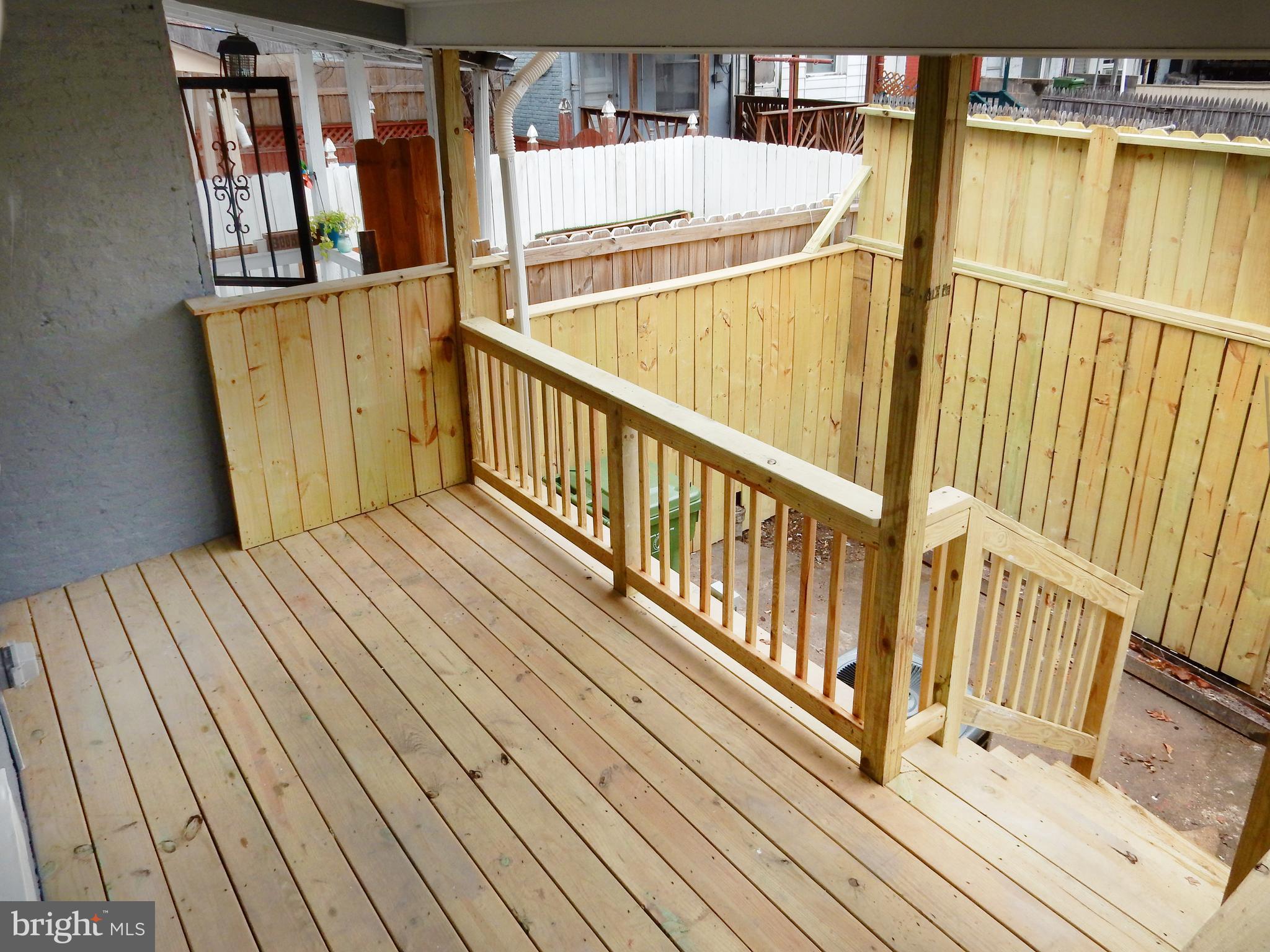 1111 Bayard Street Baltimore, MD 21223 - Photo 31 of 41 a view of a balcony with wooden floor