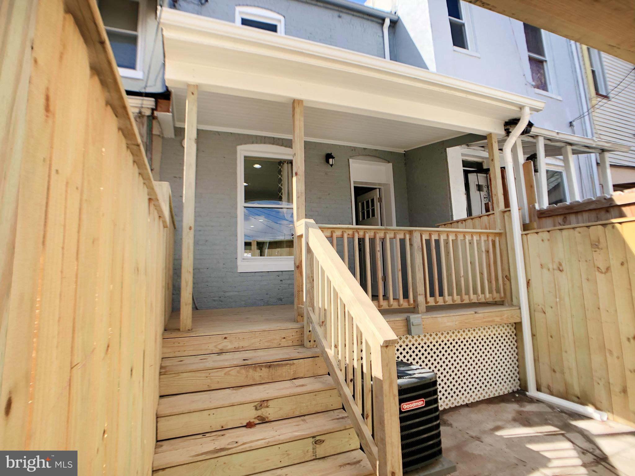1111 Bayard Street Baltimore, MD 21223 - Photo 33 of 41 a view of a house with wooden floor and stairs