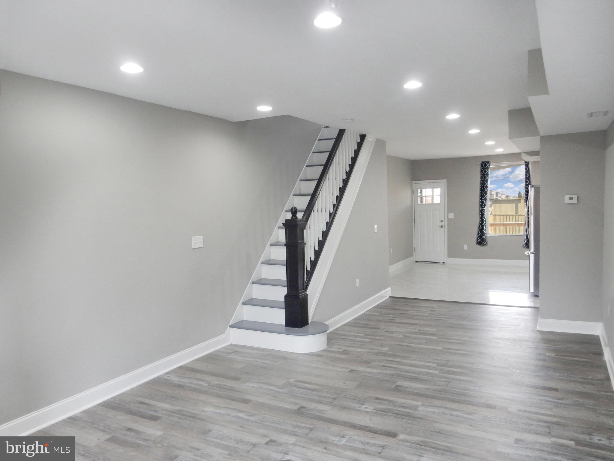 1111 Bayard Street Baltimore, MD 21223 - Photo 7 of 41 a view of entryway with wooden floor