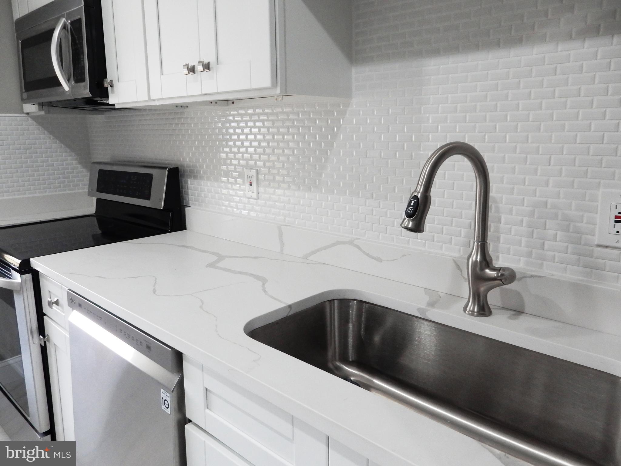 1111 Bayard Street Baltimore, MD 21223 - Photo 10 of 41 a close view of sink and tap