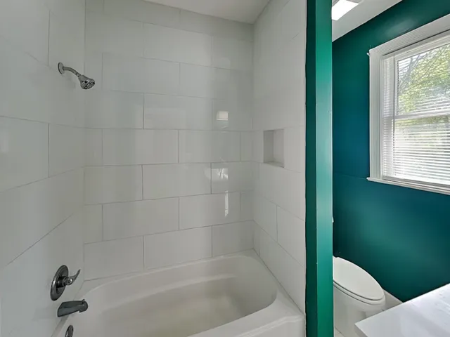 a bathroom with a bathtub