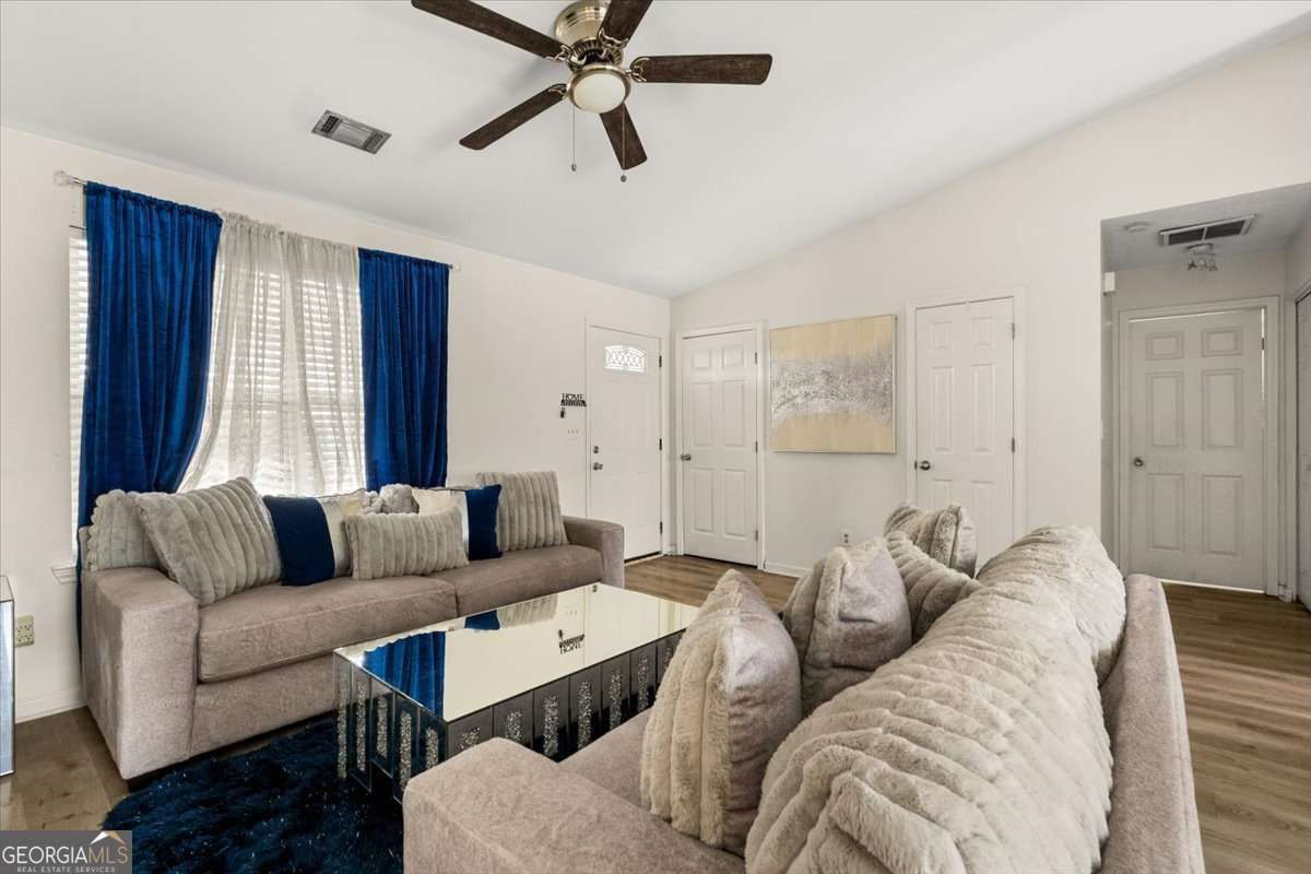 1362 Tara Road Jonesboro, GA 30238 - Photo 9 of 30 a living room with furniture and a window