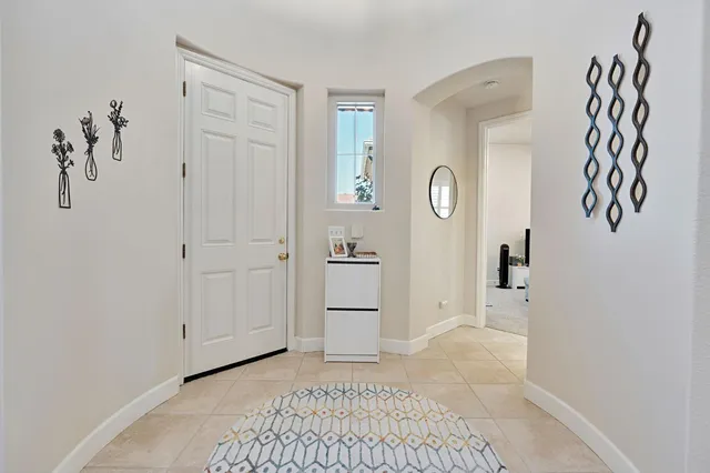 a view of a room with window and cabinet