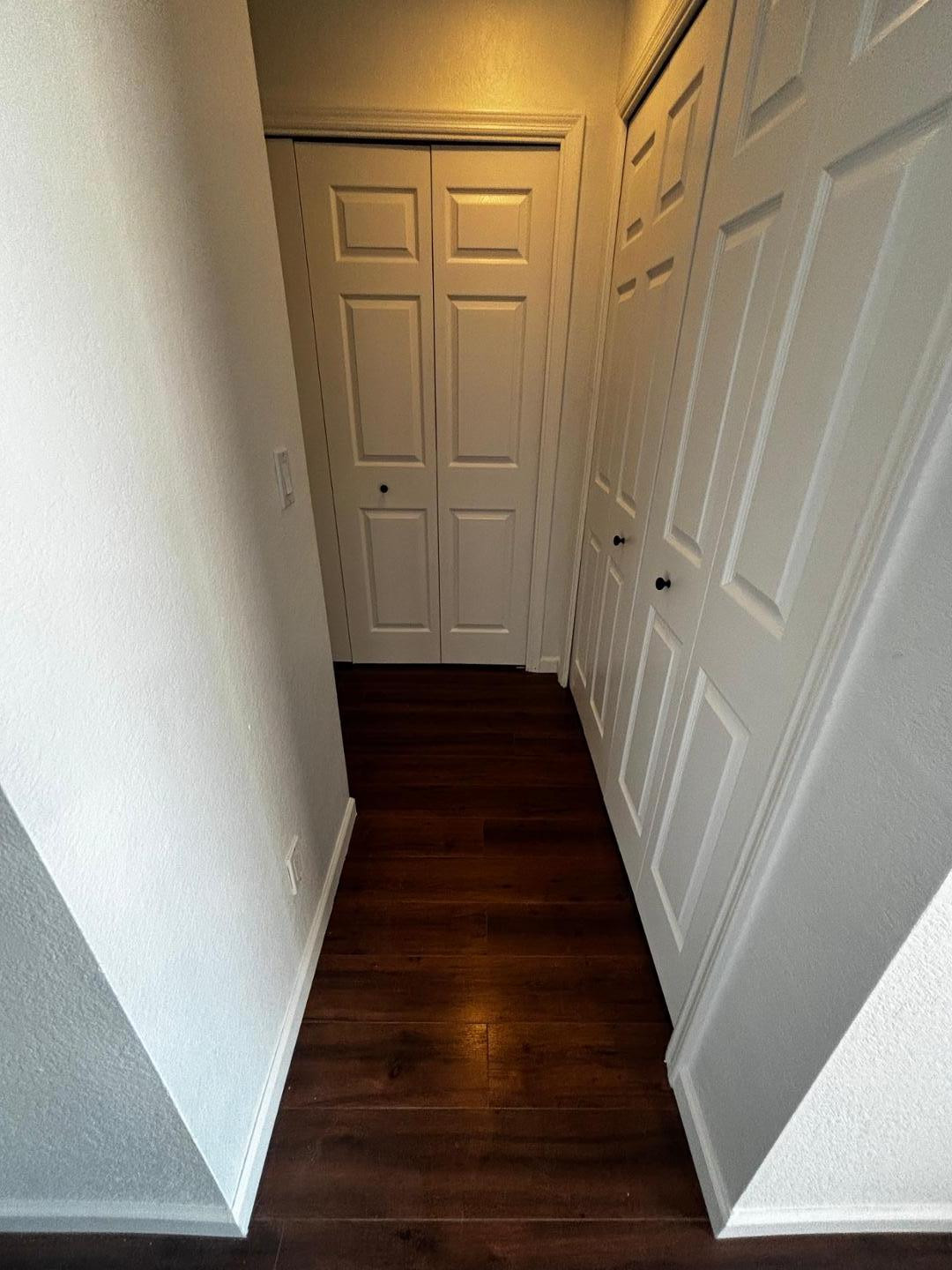 3030 North Hayden Road, Unit 16 Scottsdale, AZ 85251 - Photo 24 of 30 a view of a hallway with wooden floor and staircase