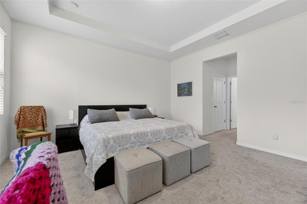 6309 Shadowlake Drive Apollo Beach, FL 33572 - Photo 26 of 64 a bedroom with a bed and window