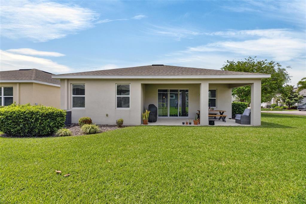 6309 Shadowlake Drive Apollo Beach, FL 33572 - Photo 45 of 64 a view of a house with a backyard