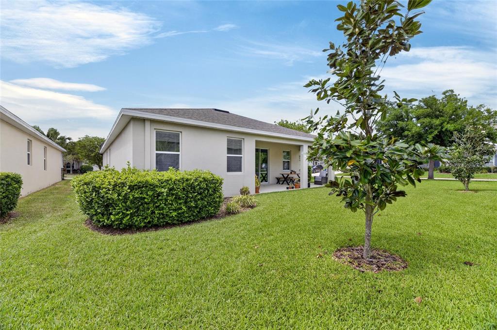 6309 Shadowlake Drive Apollo Beach, FL 33572 - Photo 47 of 64 a front view of a house with garden