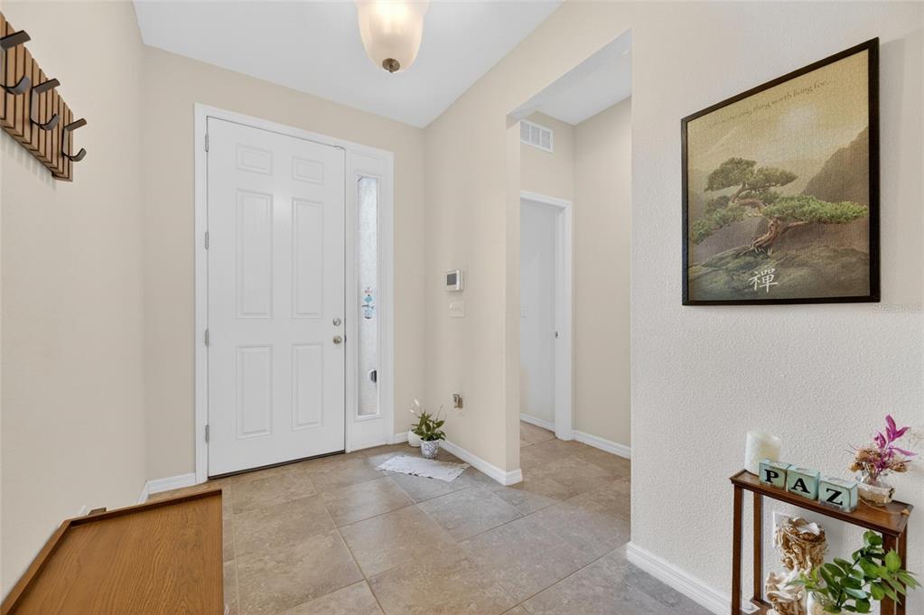 6309 Shadowlake Drive Apollo Beach, FL 33572 - Photo 9 of 64 a view of room with wall paintings and a painting on the wall