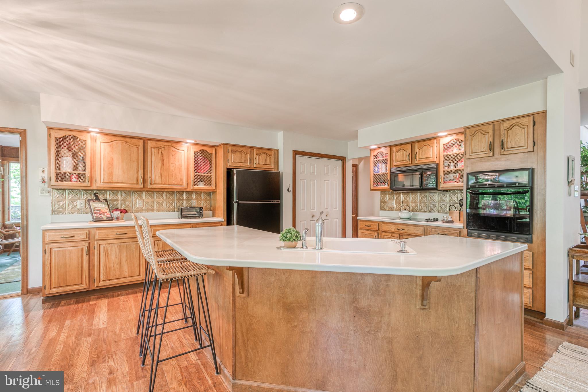 711 Bridgeview Road Feasterville-Trevose, PA 19053 - Photo 9 of 43 Wrap Around Island Bar Top Kitchen