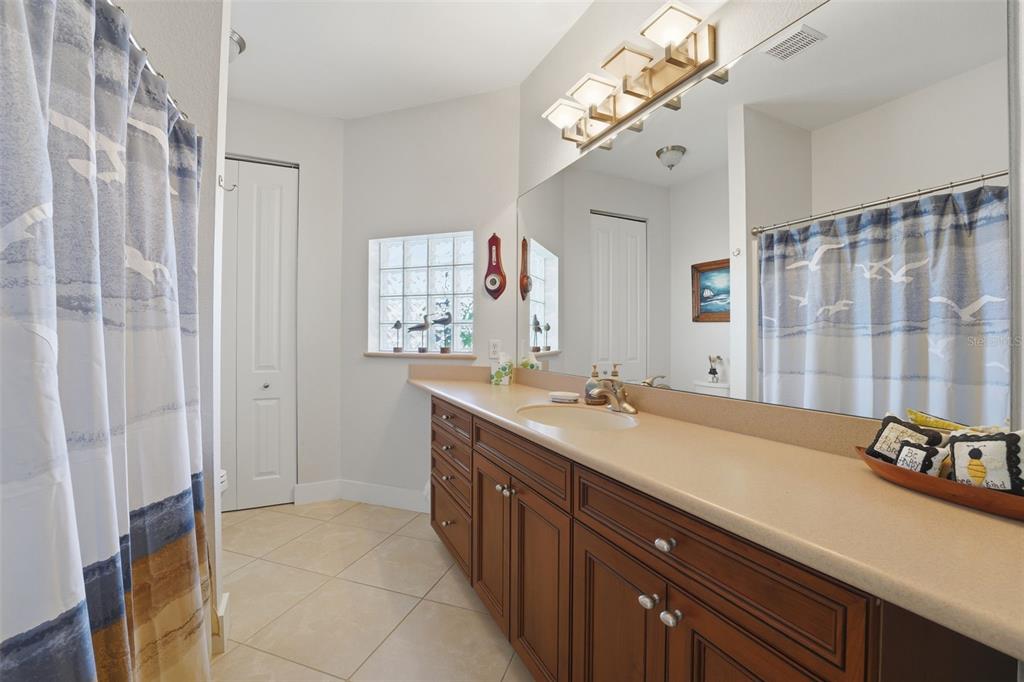 3260 Peace River Drive Punta Gorda, FL 33983 - Photo 34 of 59 a kitchen with a sink and a mirror