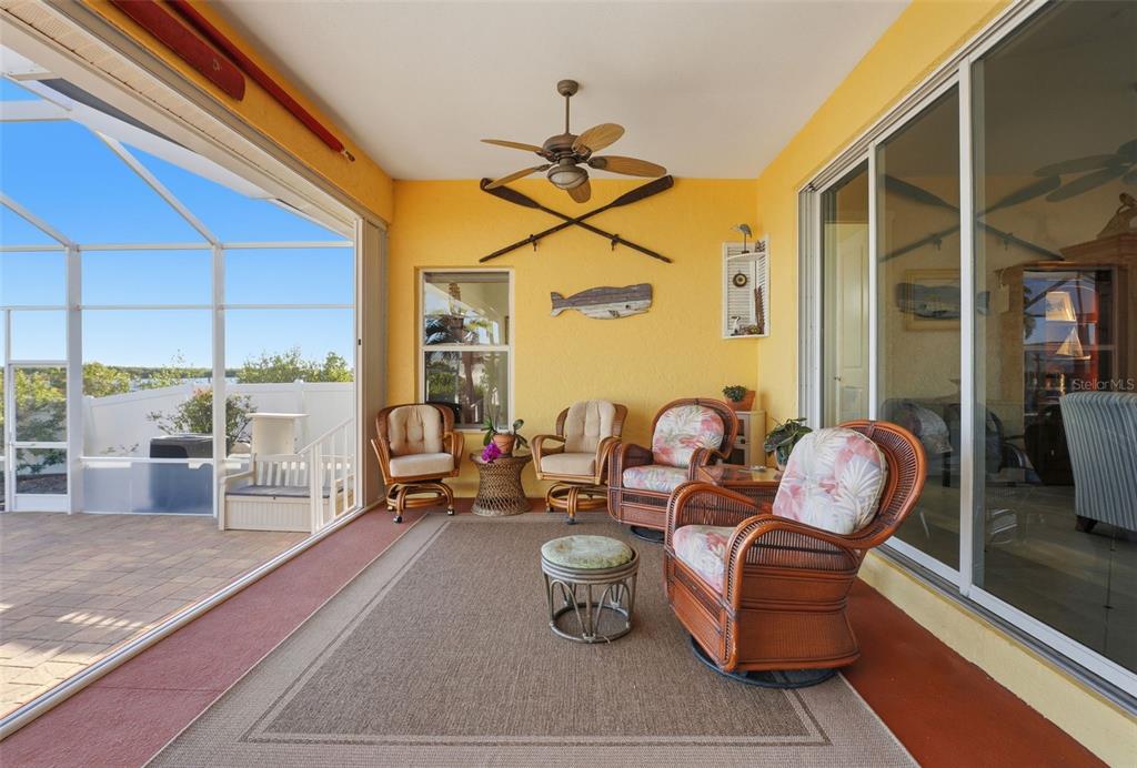 3260 Peace River Drive Punta Gorda, FL 33983 - Photo 36 of 59 a dining room with furniture and a floor to ceiling window