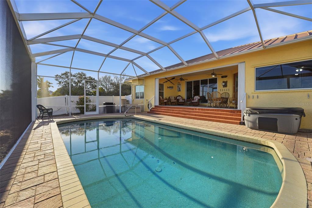 3260 Peace River Drive Punta Gorda, FL 33983 - Photo 40 of 59 a view of a swimming pool with a patio