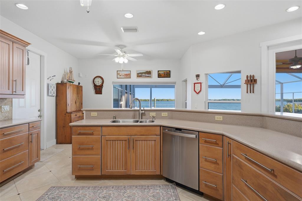 3260 Peace River Drive Punta Gorda, FL 33983 - Photo 8 of 59 a kitchen with a sink stove and cabinets