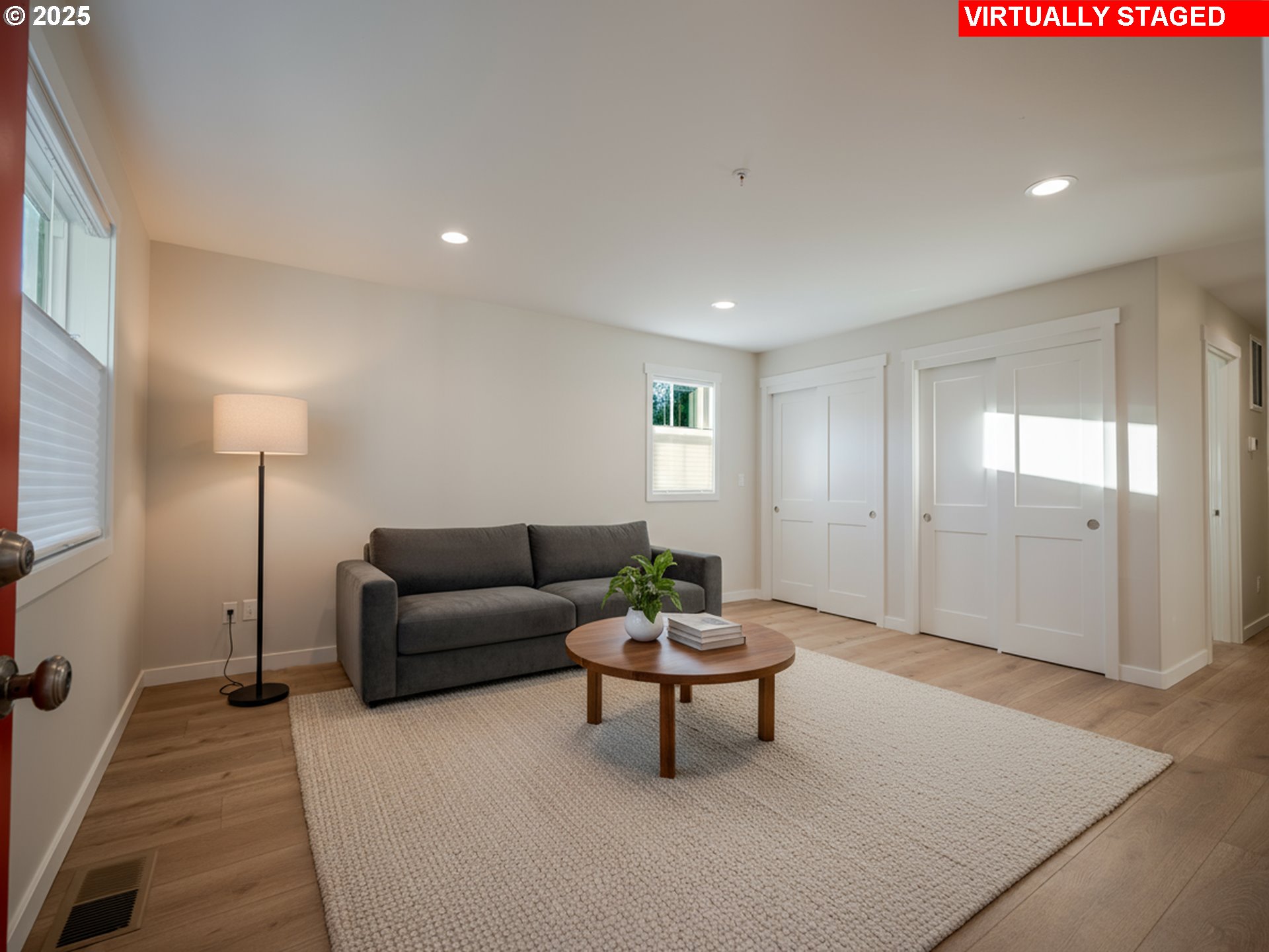 420 Elk Creek Road, Unit 401 Cannon Beach, OR 97110 - Photo 11 of 31 a living room with furniture and a potted plant