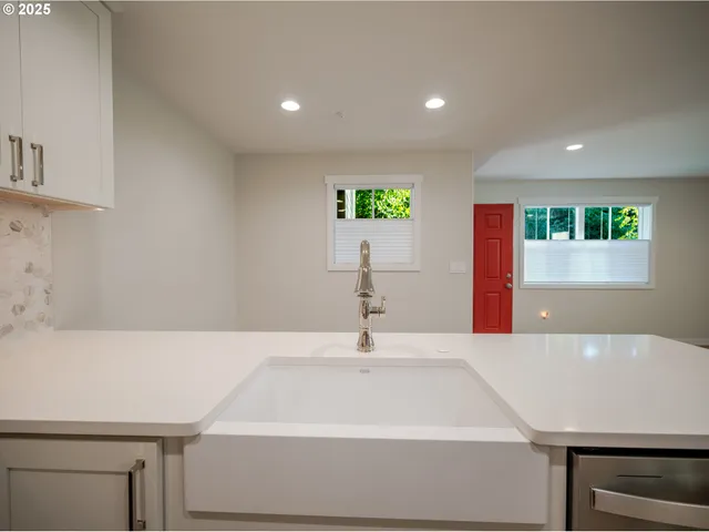 a bathroom with a sink and a bathtub