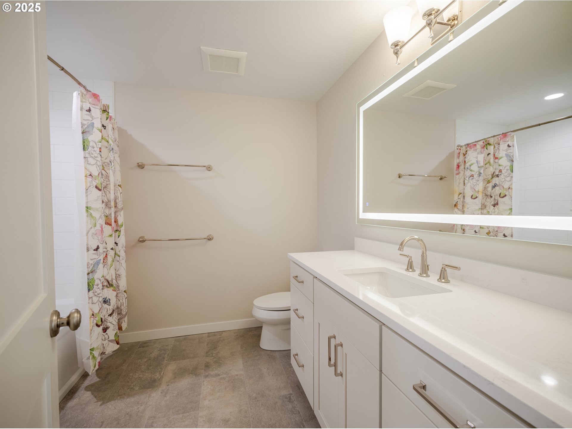 420 Elk Creek Road, Unit 401 Cannon Beach, OR 97110 - Photo 22 of 31 a bathroom with a sink a toilet and shower