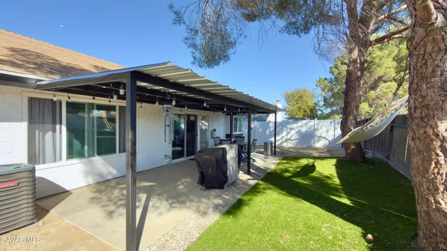 a front view of a house with patio