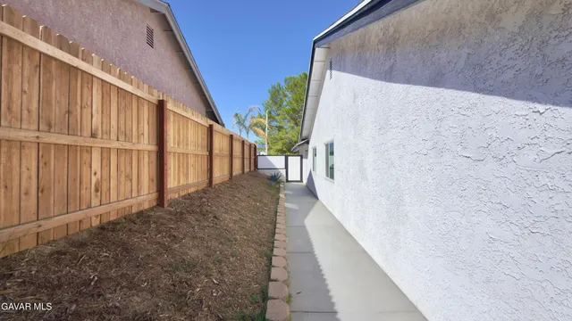 a view of a house with a patio