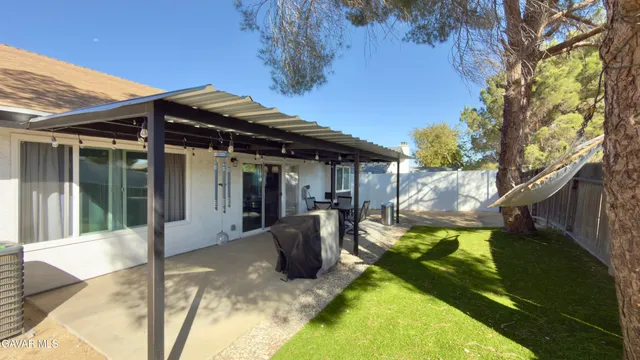a front view of a house with yard