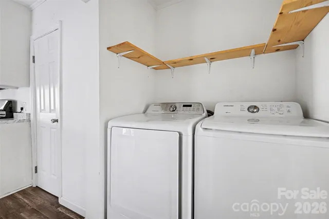 a utility room with dryer and washer