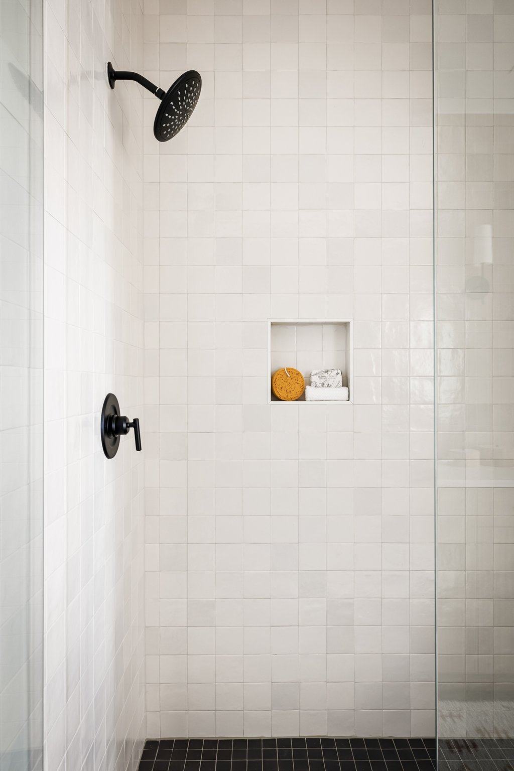3500 Pecan Springs Road, Unit 13 Austin, TX 78723 - Photo 19 of 33 Floor to ceiling handmade tiles adorn the shower, elevating the pace to have a spa-like feel.