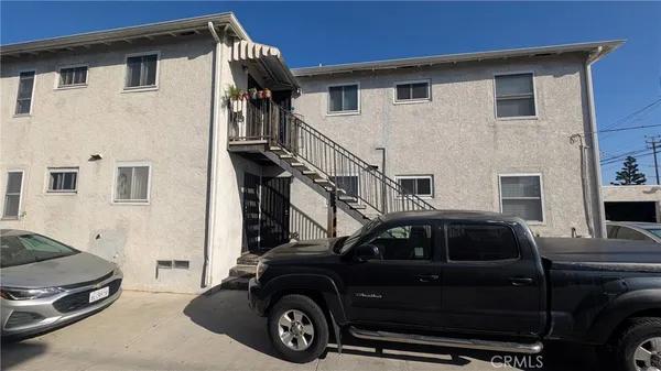 a car parked in front of a house