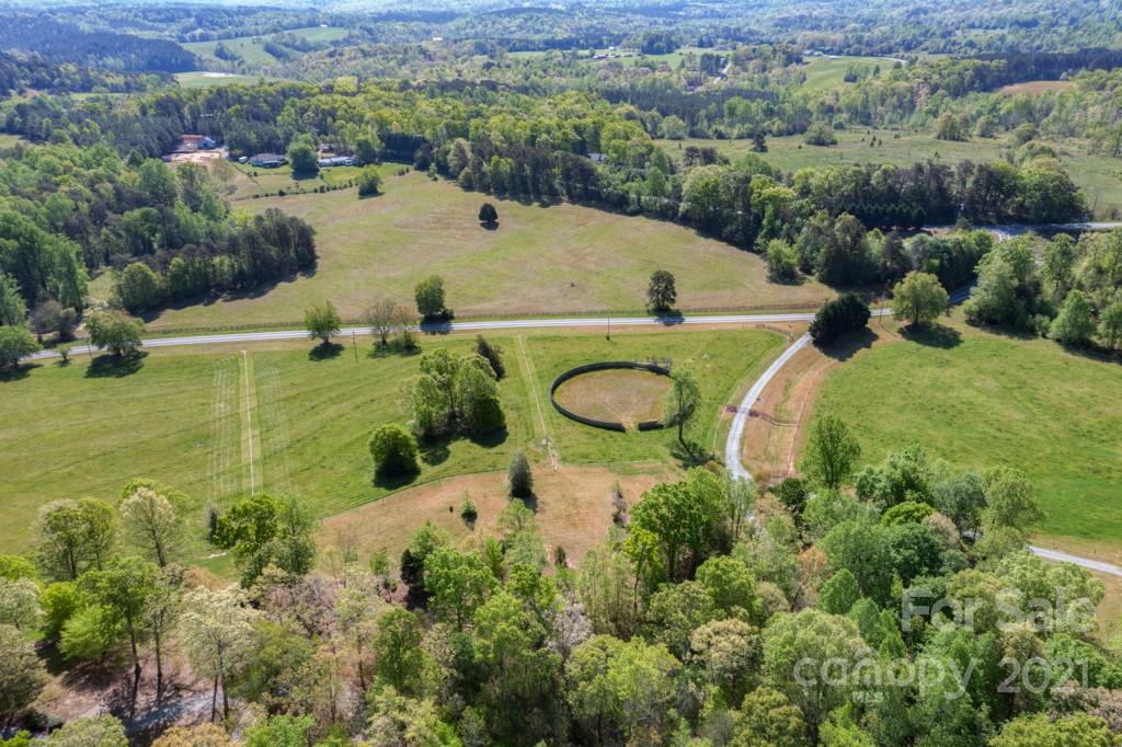 85 Moore Road Tryon, NC 28782 - Photo 2 of 20 an aerial view of a house with a yard
