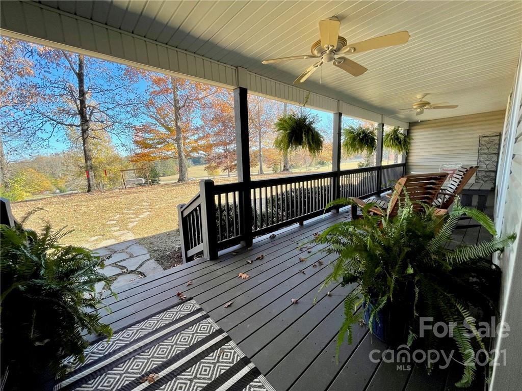 85 Moore Road Tryon, NC 28782 - Photo 4 of 20 a view of a balcony with chairs