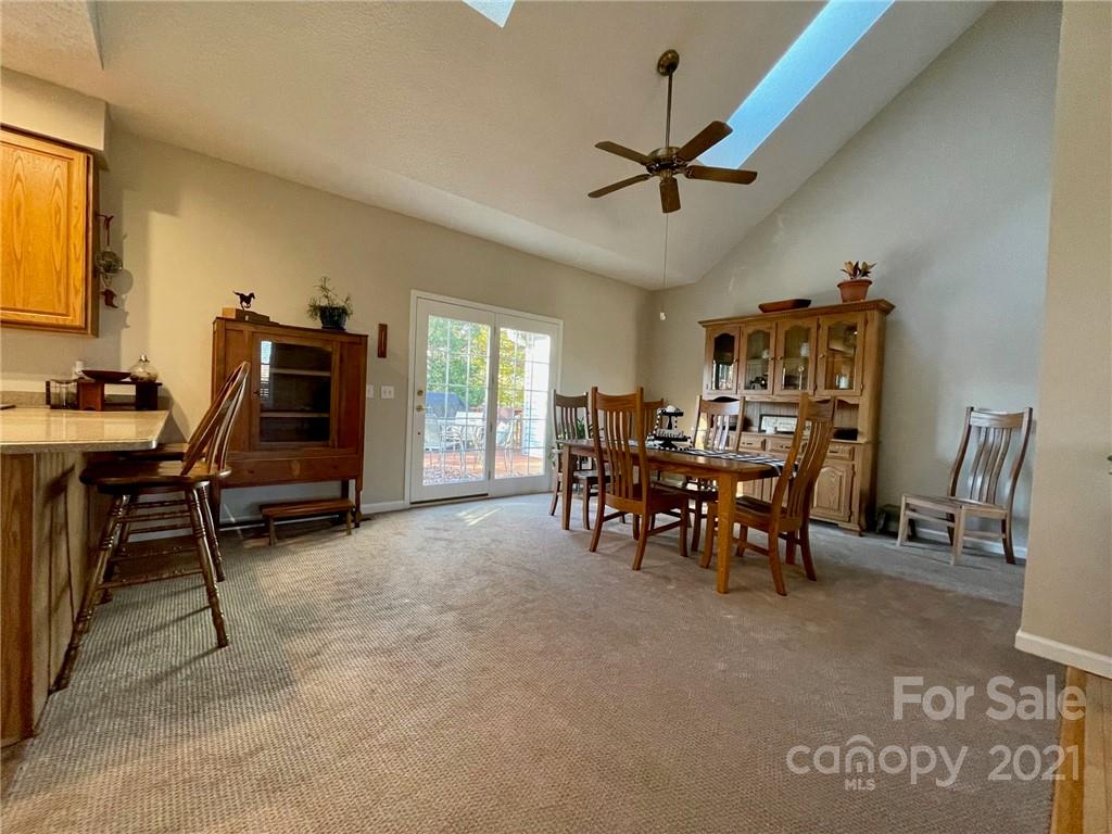 85 Moore Road Tryon, NC 28782 - Photo 8 of 20 a view of a livingroom with furniture and a window