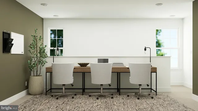 a view of a livingroom with furniture and window