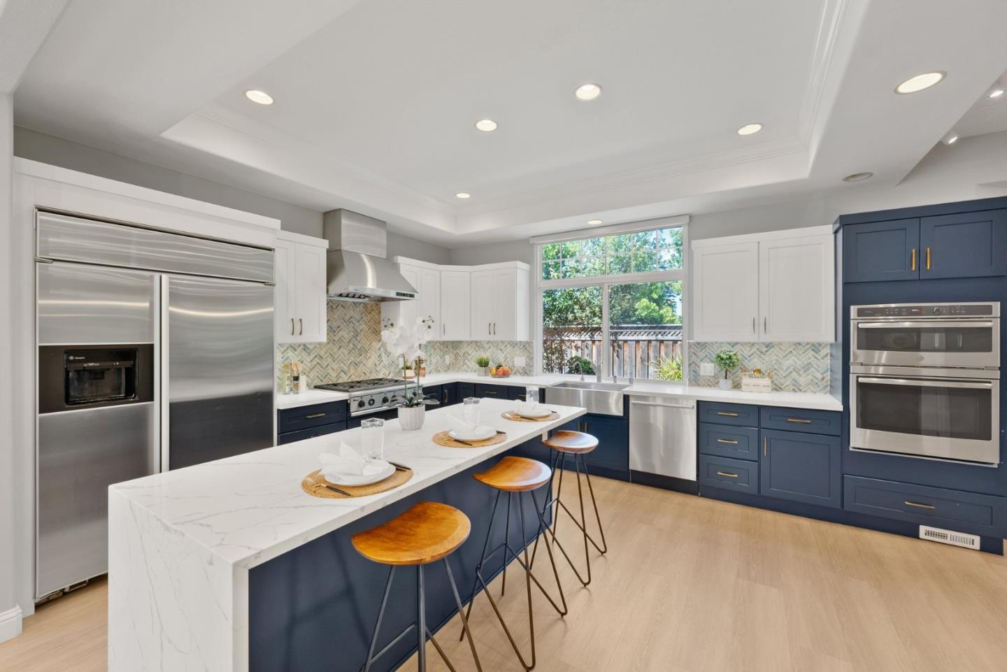 1173 Elysian Place San Jose, CA 95125 - Photo 15 of 60 a kitchen with a sink a stove a refrigerator and cabinets
