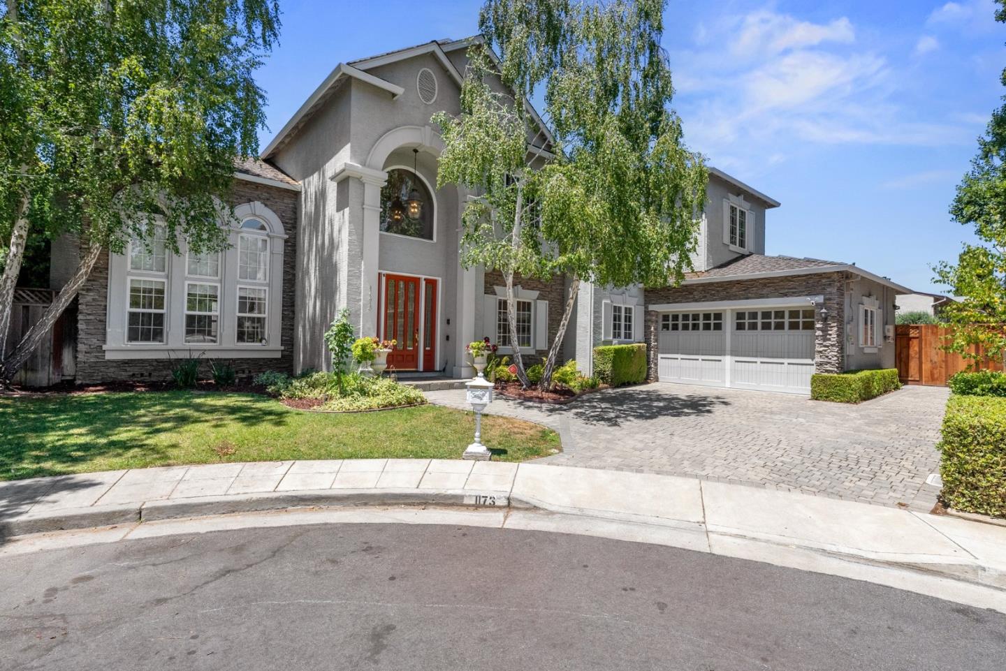1173 Elysian Place San Jose, CA 95125 - Photo 2 of 60 a front view of a house with a yard and garage