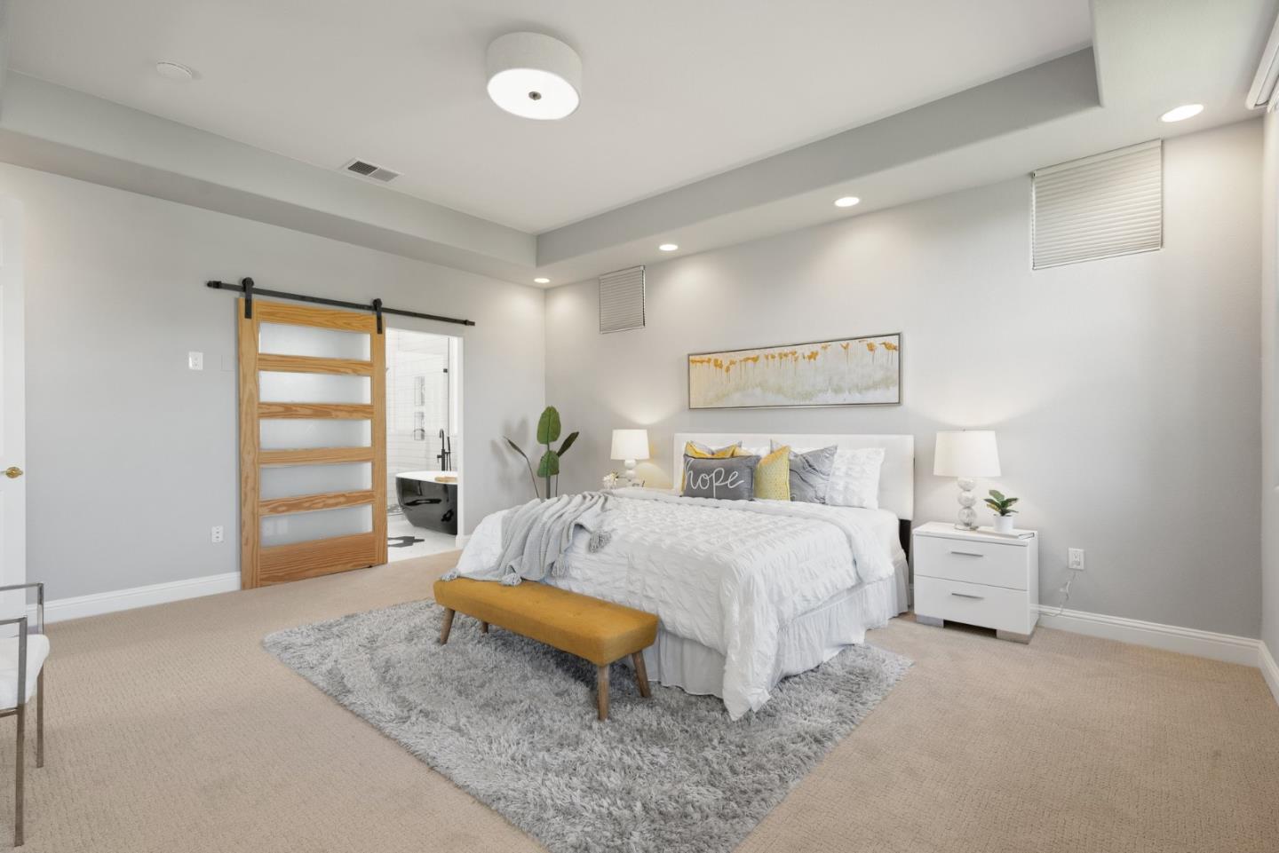 1173 Elysian Place San Jose, CA 95125 - Photo 31 of 60 a spacious bedroom with a bed a table and potted plant