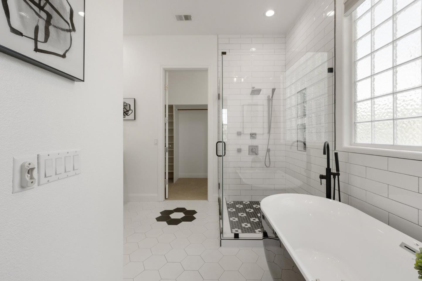 1173 Elysian Place San Jose, CA 95125 - Photo 34 of 60 a bathroom with a tub shower and a sink