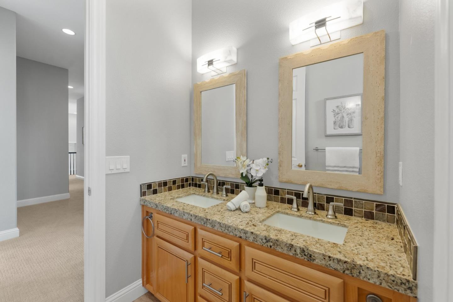 1173 Elysian Place San Jose, CA 95125 - Photo 41 of 60 a bathroom with a granite countertop sink and a mirror