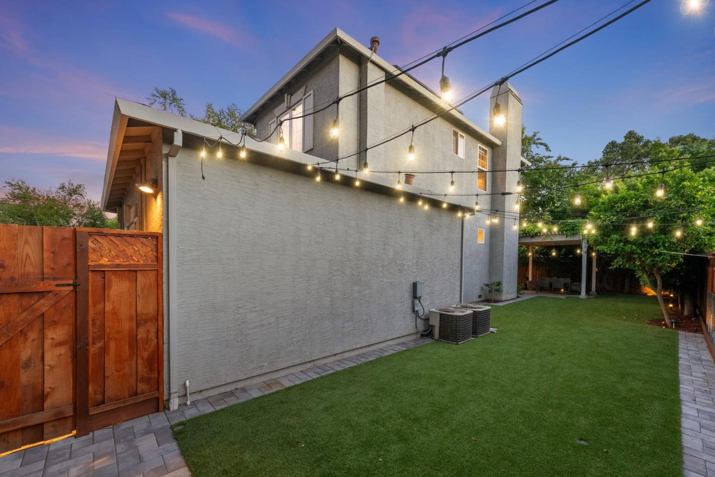 1173 Elysian Place San Jose, CA 95125 - Photo 55 of 60 a backyard of a house with chairs and a fire pit