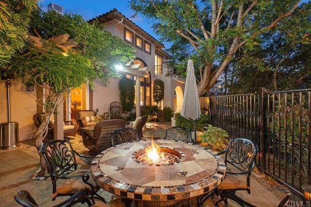 a view of a chairs and tables in the patio