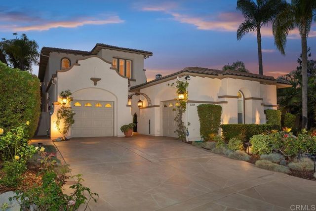front view of a house with a street