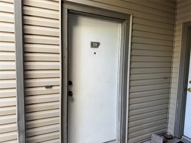 a kitchen with a stove and a microwave