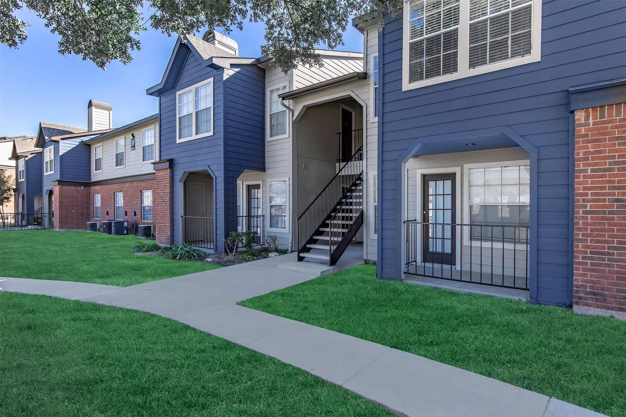 8301 Boat Club Road, Unit 1214 Fort Worth, TX 76179 - Photo 42 of 44 a front view of a house with a garden