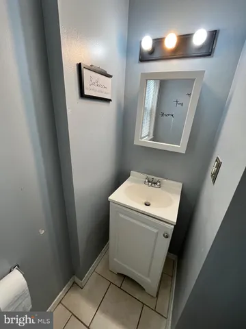 a view of a hallway with washer and dryer